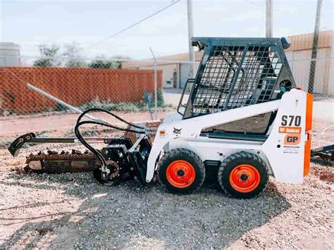 saw trencher skid steer attachment|trenching attachment for bobcat.